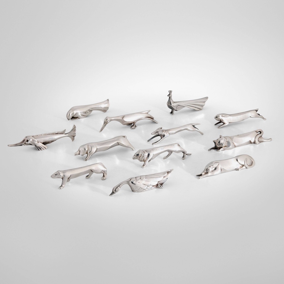 233_1_une_vision_moderne_design_from_a_european_country_home_january_2025_edouard_marcel_sandoz_gallia_animalier_figural_knife_rests_set_of_twelve__wright_auction.jpeg